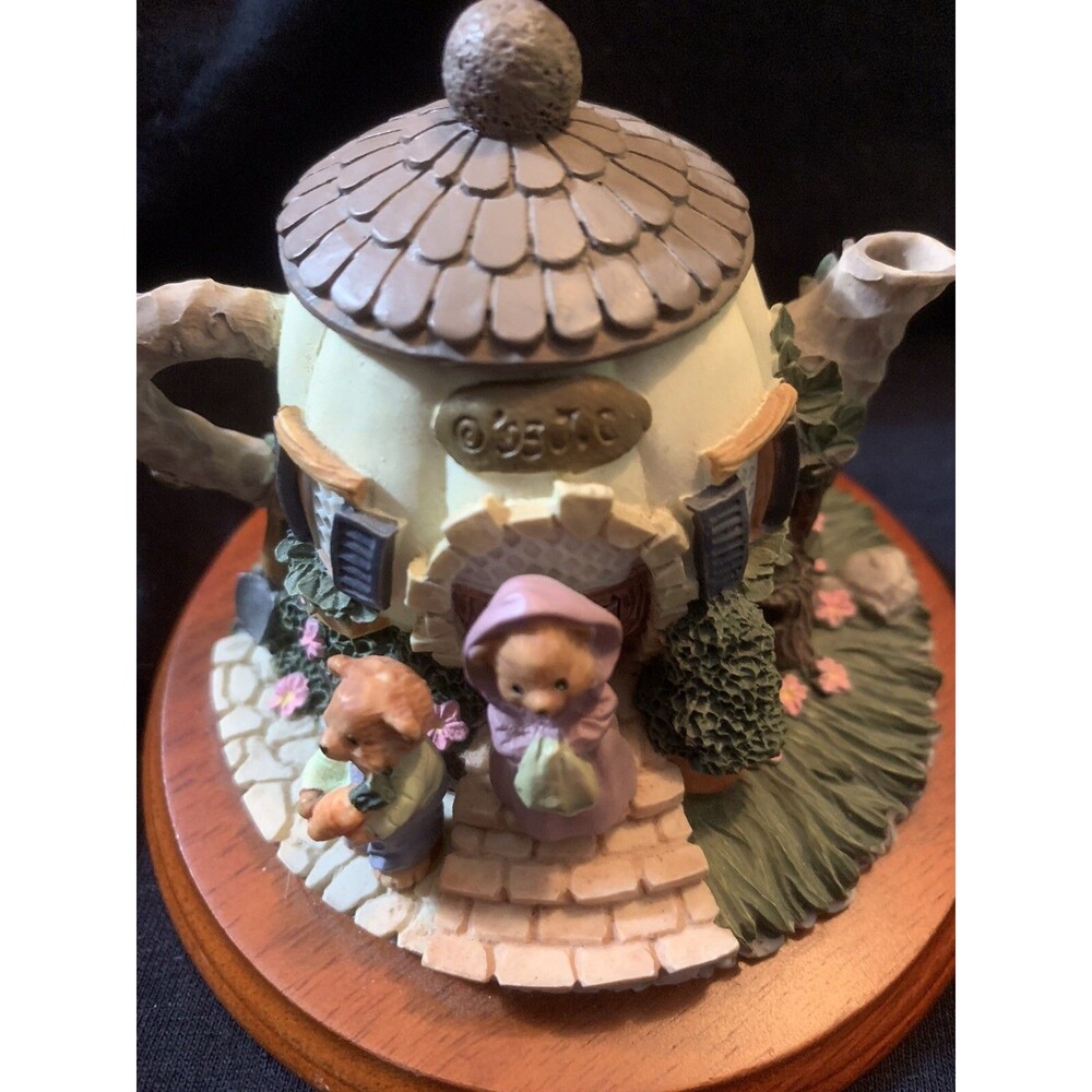 Decorative Bear Cottage Teapot Figurine on wood Display Stand￼